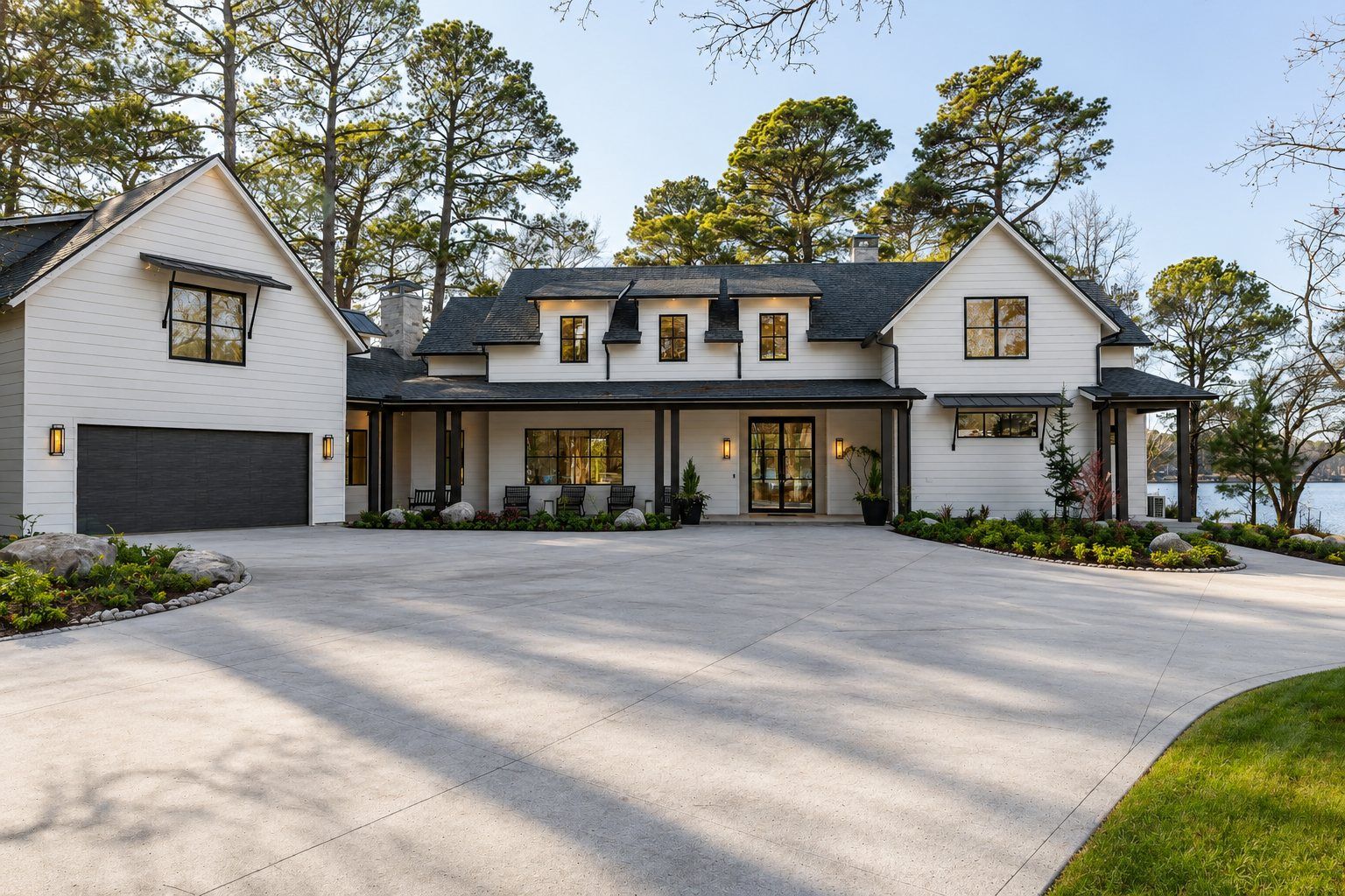 Front elevation of a modern lakeside farmhouse