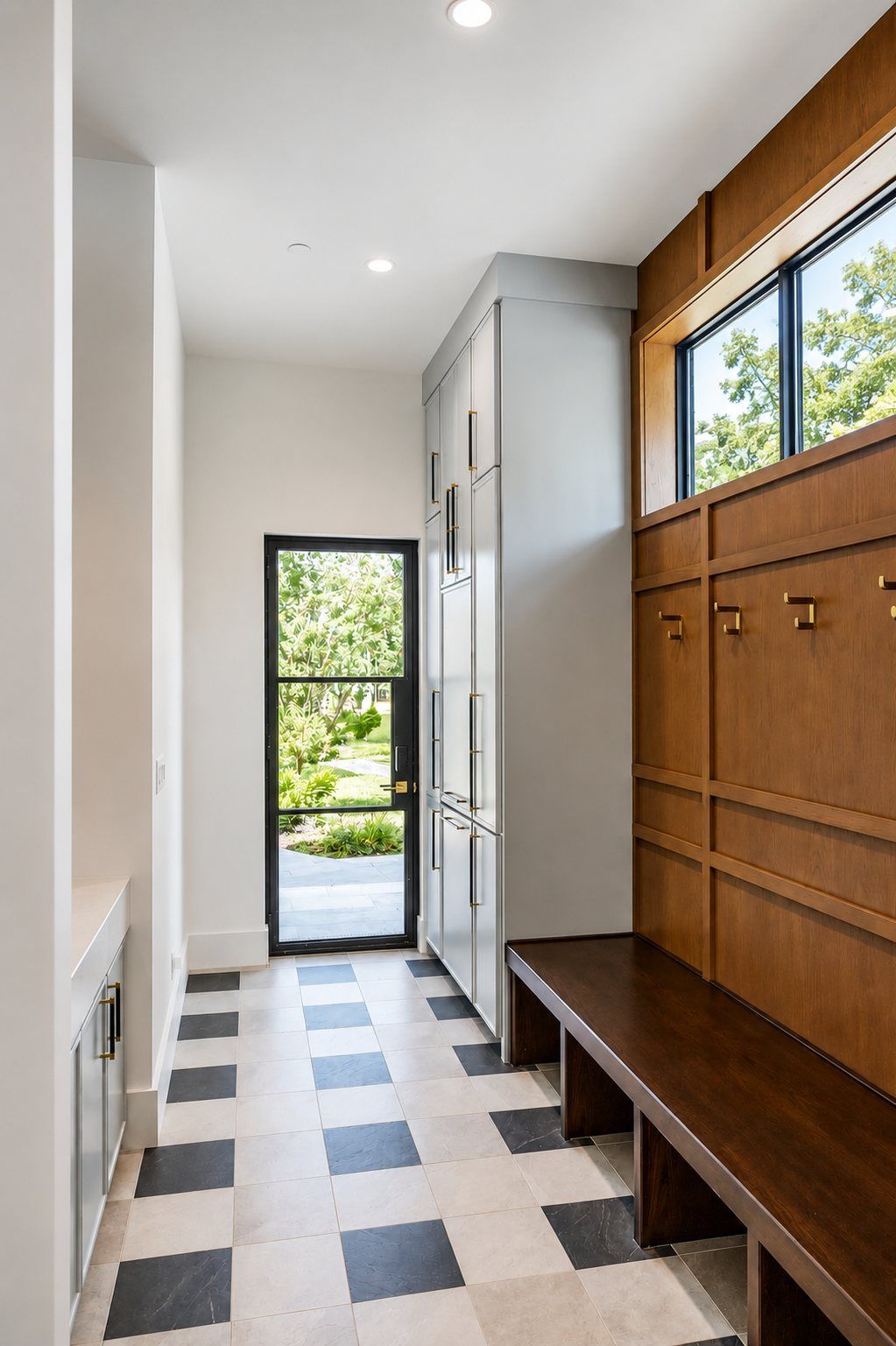 Mud room with a steel-framed glass door