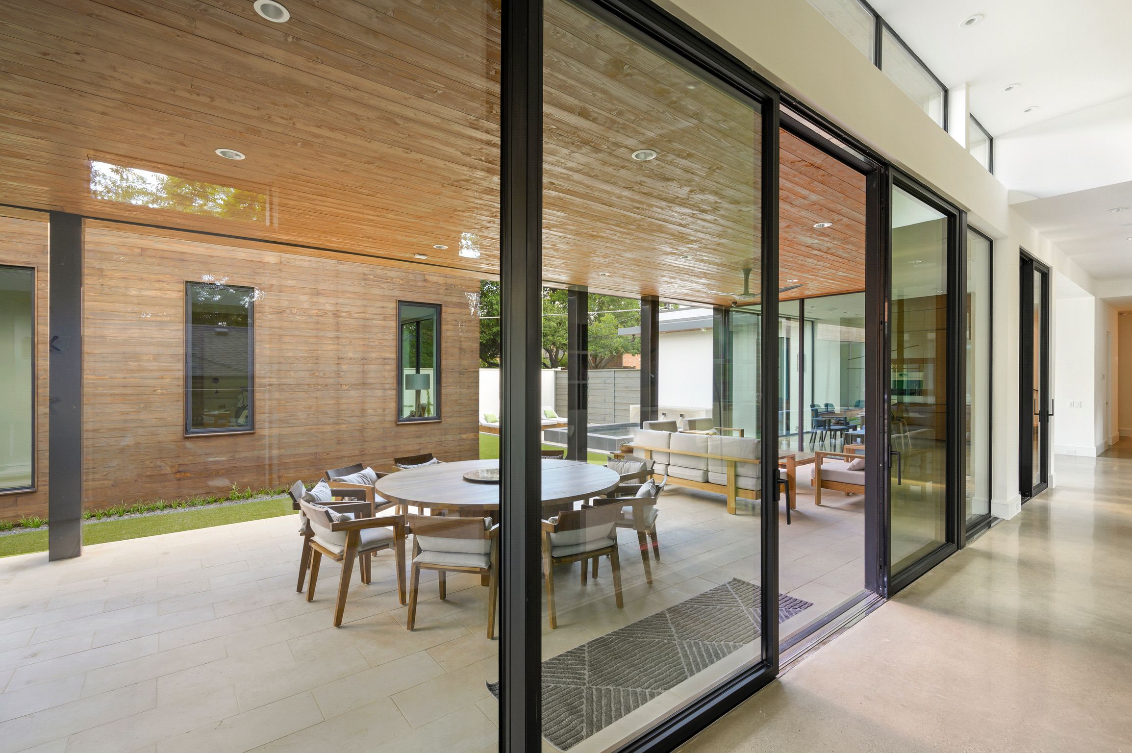 Covered patio steel-and-glass wall