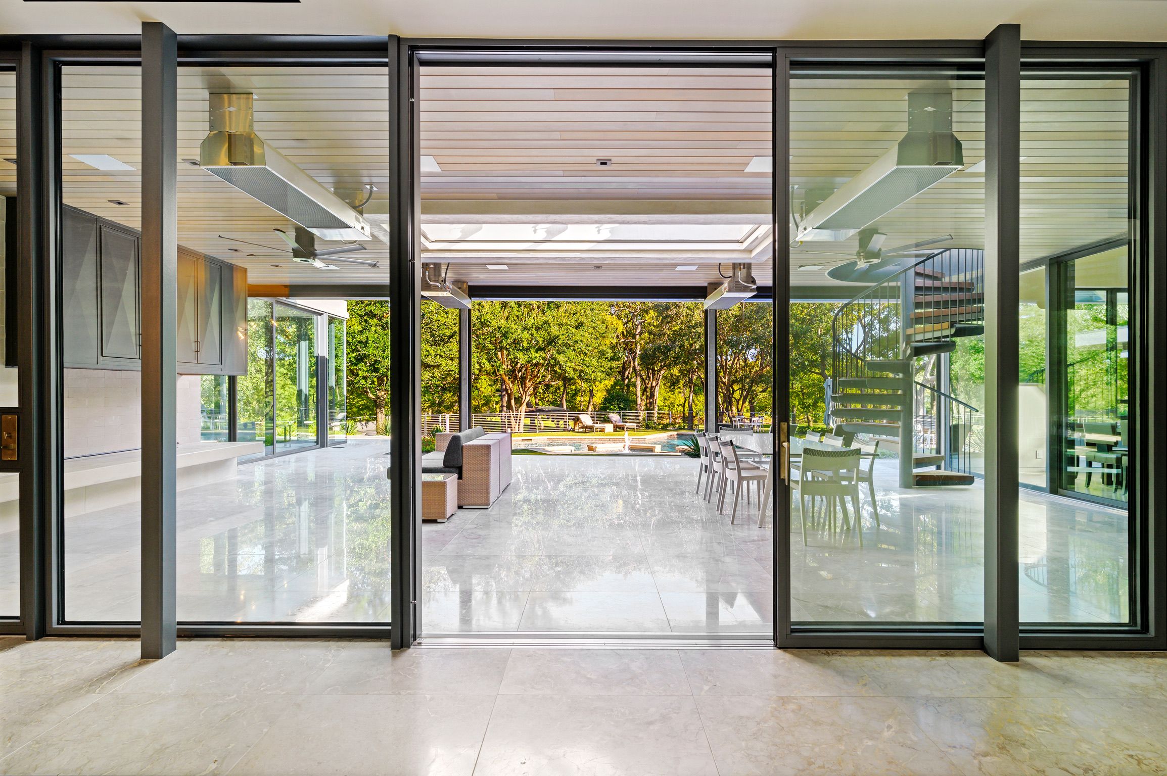 Open steel slider framing the patio view