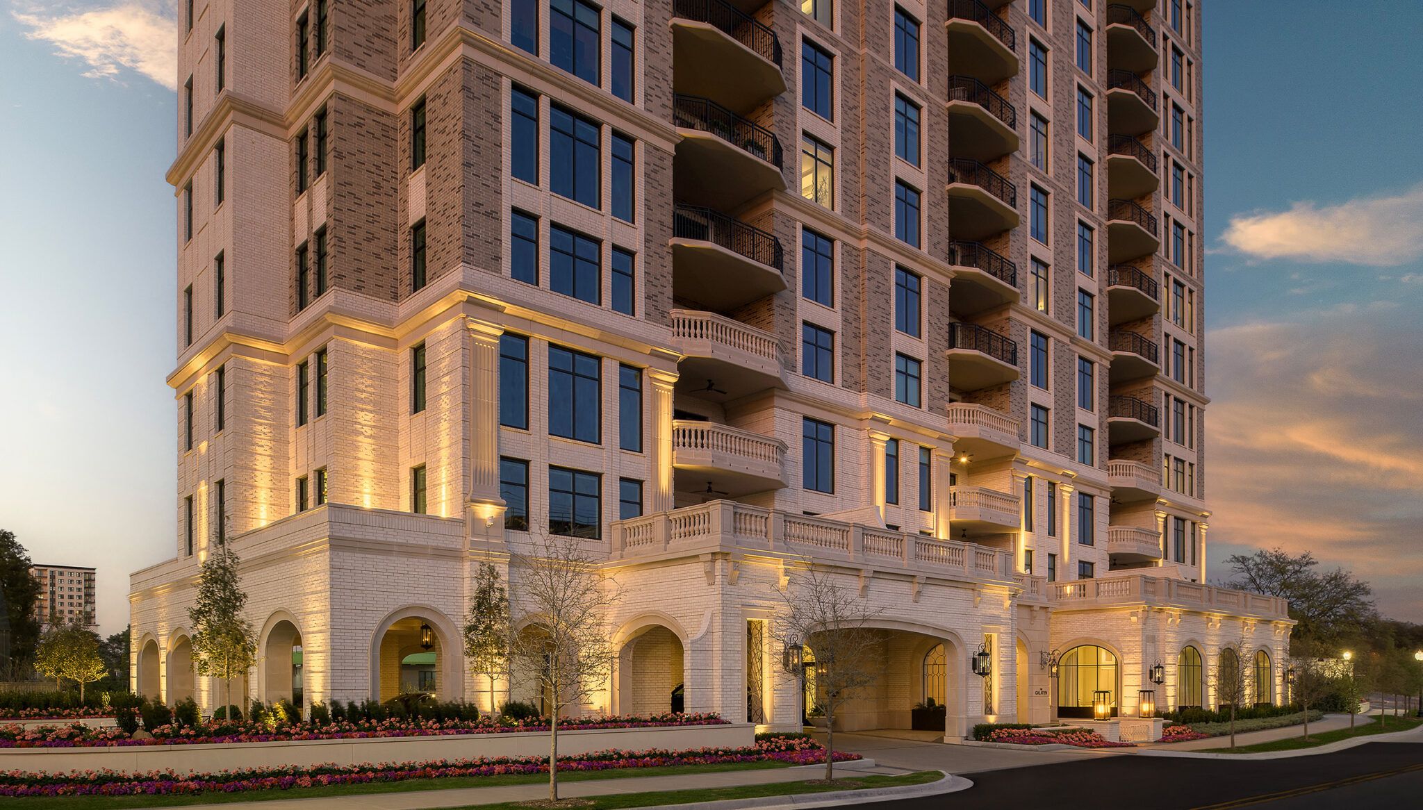 The Galatyn arched loggia exterior illuminated at dusk