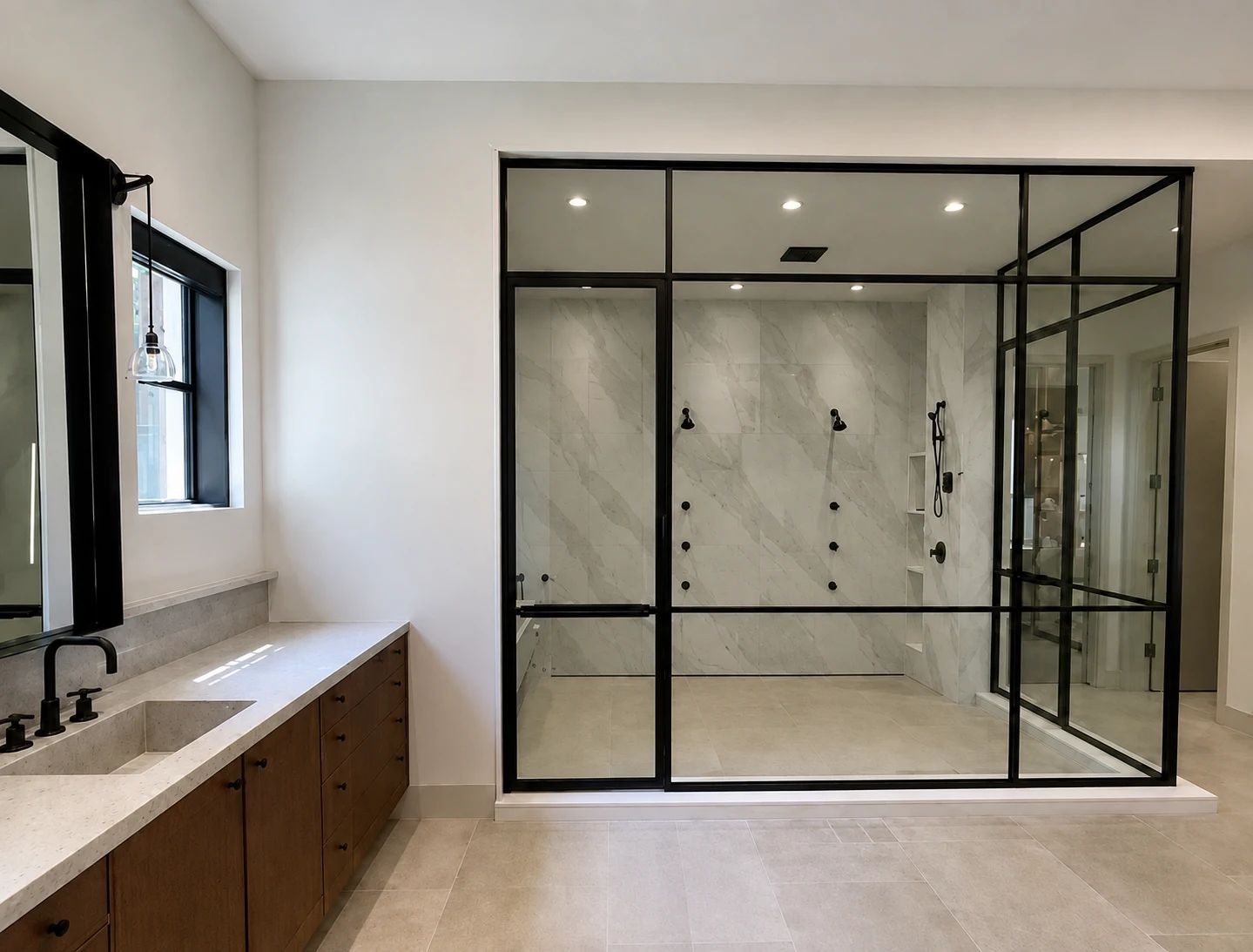 Espresso-finished steel-and-glass shower enclosure wrapping a marble wet room in Westlake, Texas
